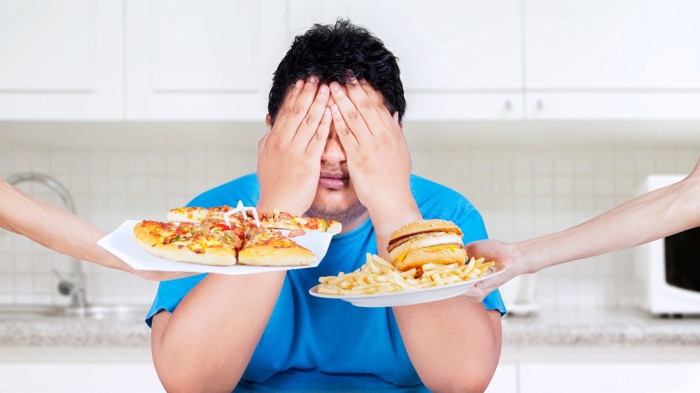 A man getting tired of unhealthy food
