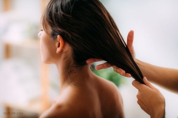 Woman has a relaxing hair massage