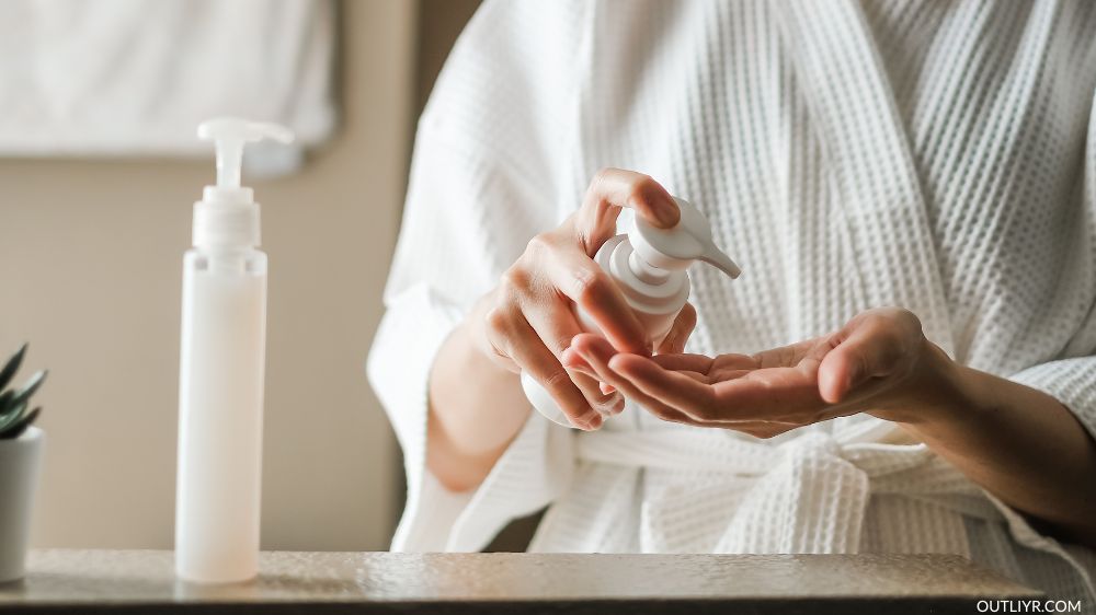 A woman doing her skincare routine