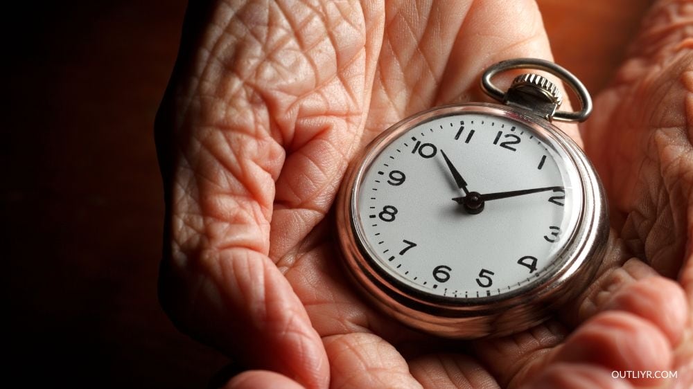 Clock on an old person's hands 