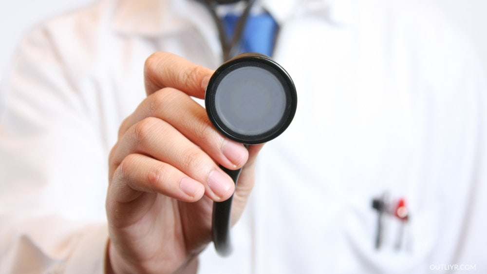 Doctor holding a stethoscope to make a root cause diagnosis