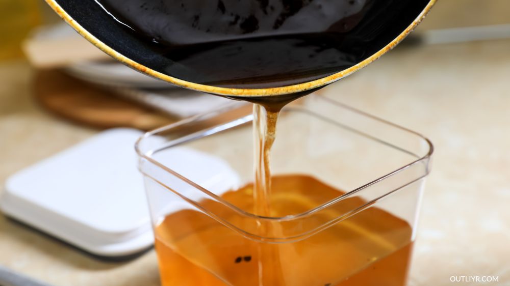 Used vegetable oil poured into a container